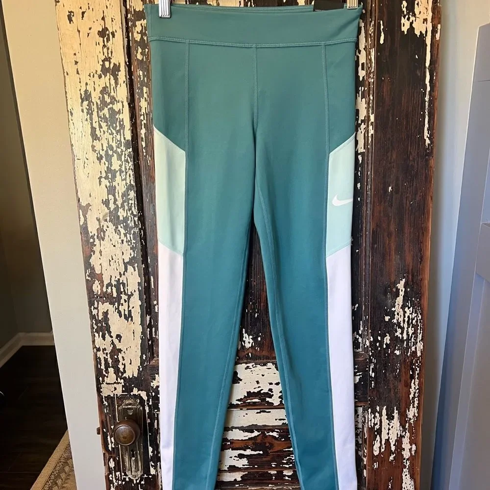 NWT Nike Dri-Fit girls two tone training leggings tights. Size XL. Tights fit.